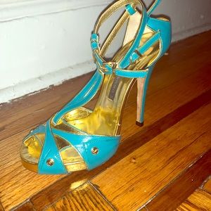 Courtney Crawford cage high heel sandals